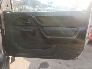 PANNELLO RIVESTIMENTO PORTA ANT. DX. SUZUKI JIMNY «I» (1999) [it074398]